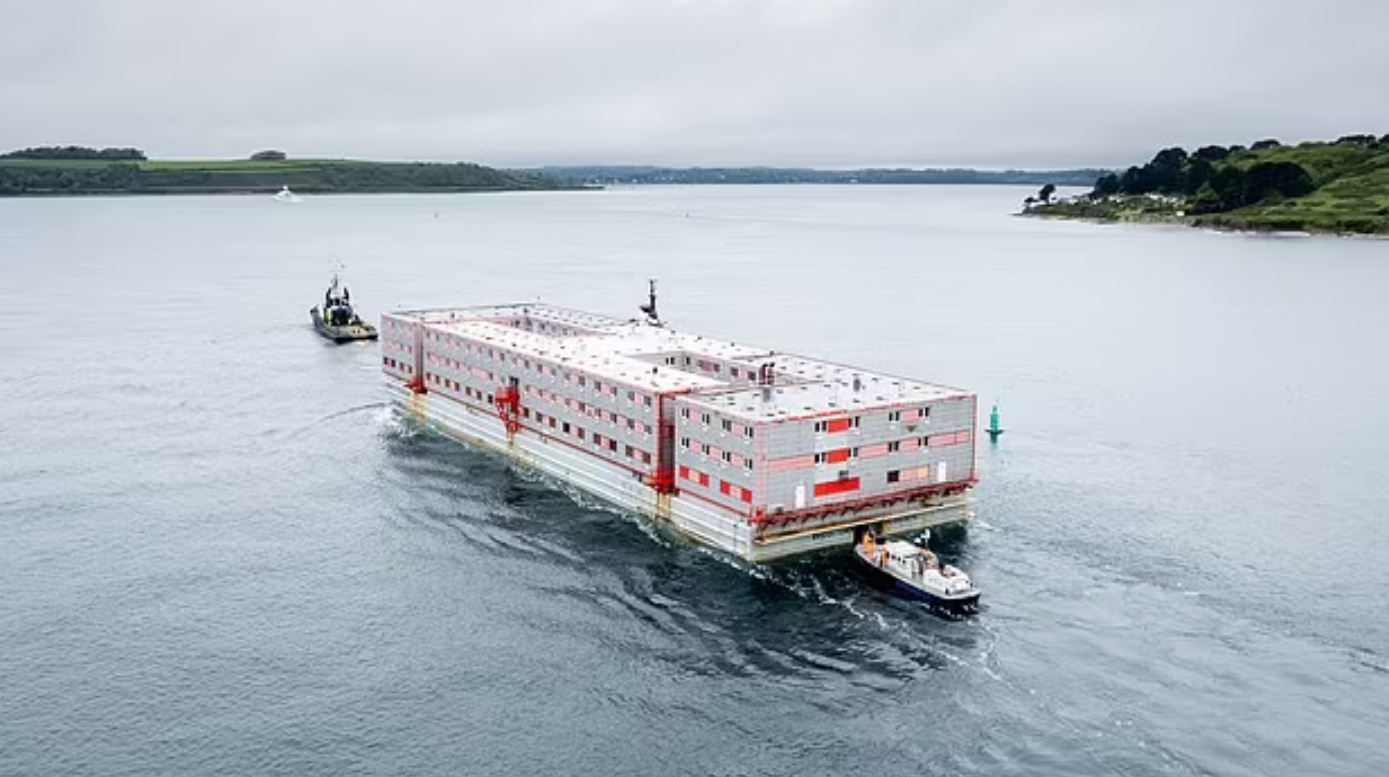 Asylum seekers who will be housed on migrant barge off the coast of Dorset will be ‘free to come and go as they want’ and will be provided with free bus service into town, Home Office confirms