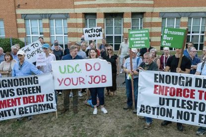 The residents fighting back against traveller land grabs: Villagers descend on council offices to demand eviction from Essex field – days after another site was cleared following protest