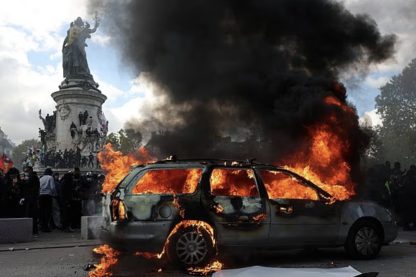 French protests spread across Europe as buildings are set on fire, cars overturned and riot police arrest more than 270