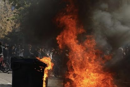 ‘Student’ riots rock France as masked men torch schools and douse teachers in petrol